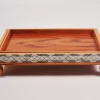 Large handcrafted wooden tray, carefully crafted and decorated with intricate mother-of-pearl inlays for an open buffet.