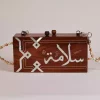 Handmade women's handbag inlaid with natural mother-of-pearl