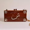 Handmade women's handbag inlaid with natural mother-of-pearl