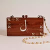 Handmade women's handbag inlaid with natural mother-of-pearl