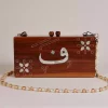 Handmade women's handbag inlaid with natural mother-of-pearl