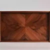 A set of handmade rectangular wooden trays inlaid with pearl pieces in a wonderful geometric shape