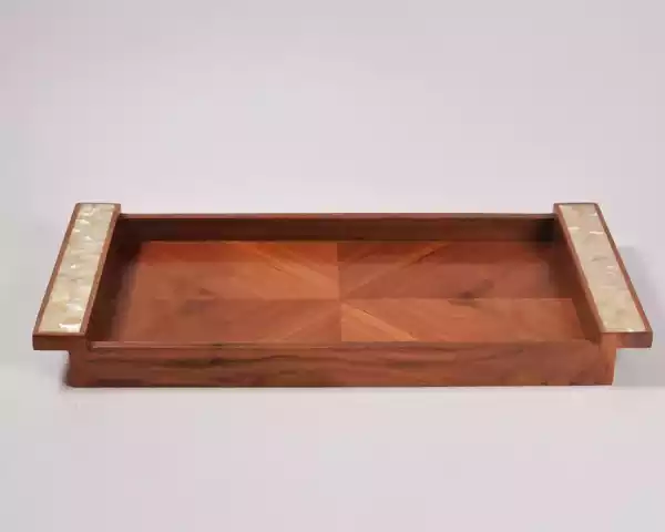 A set of handmade rectangular wooden trays inlaid with pearl pieces in a wonderful geometric shape