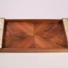 A set of handmade rectangular wooden trays inlaid with pearl pieces in a wonderful geometric shape