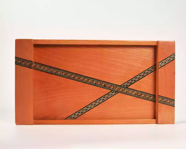 A set of three handmade trays inlaid with Damascene mosaics