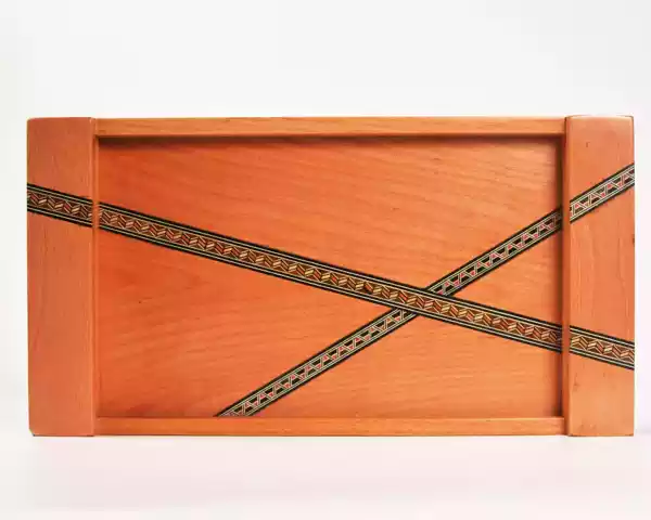 A set of three handmade trays inlaid with Damascene mosaics