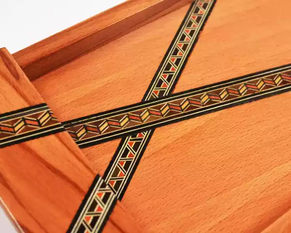 A set of three handmade trays inlaid with Damascene mosaics