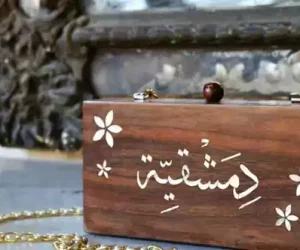 Handmade women's handbag inlaid with natural mother-of-pearl