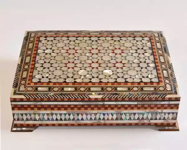 luxury  handmade wooden box, meticulously crafted and fully inlaid with stunning mother of pearls in a mesmerizing