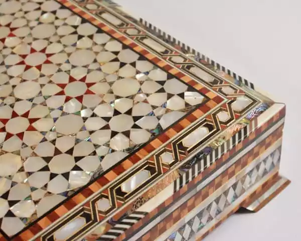 luxury  handmade wooden box, meticulously crafted and fully inlaid with stunning mother of pearls in a mesmerizing