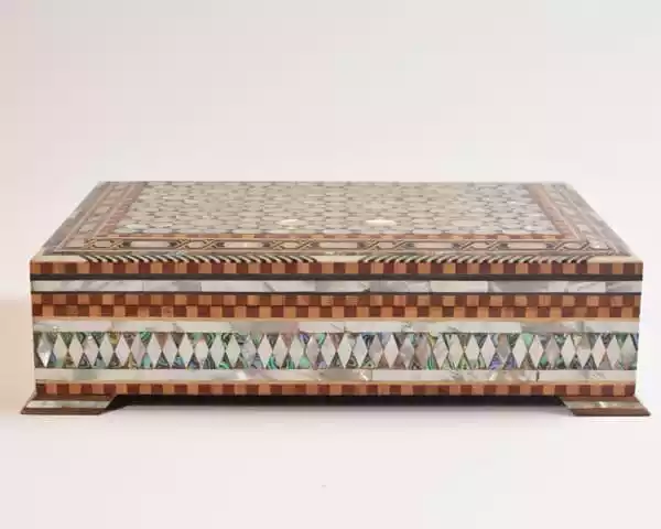 luxury  handmade wooden box, meticulously crafted and fully inlaid with stunning mother of pearls in a mesmerizing