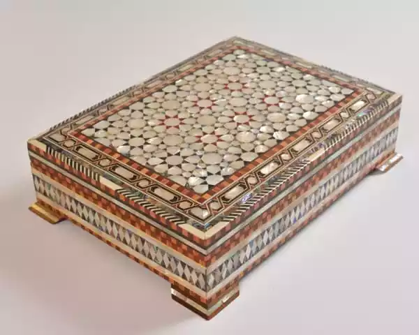 luxury  handmade wooden box, meticulously crafted and fully inlaid with stunning mother of pearls in a mesmerizing