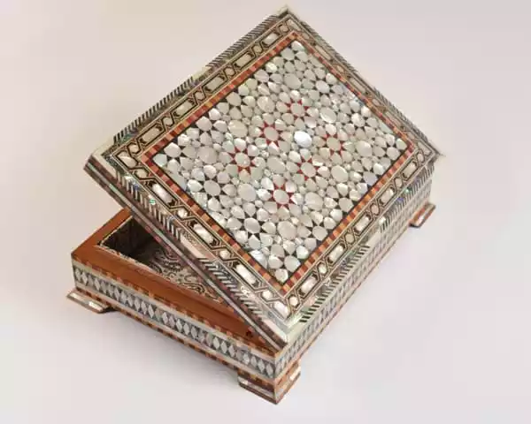 luxury  handmade wooden box, meticulously crafted and fully inlaid with stunning mother of pearls in a mesmerizing