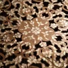 Round table carved and inlaid with mother-of-pearl
