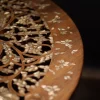 Round table carved and inlaid with mother-of-pearl
