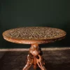 Round table carved and inlaid with mother-of-pearl