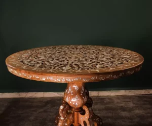 Round table carved and inlaid with mother-of-pearl
