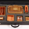 A distinctive and luxurious desk set, handcrafted from lemon wood and inlaid with copper