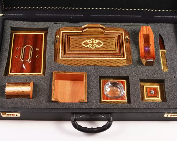 1 A distinctive and luxurious desk set, handcrafted from lemon wood and inlaid with copper