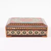 wooden box inlaid with copper with a traditional Islamic design