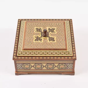 A distinctive and luxurious desk set, handcrafted from lemon wood and inlaid with copper