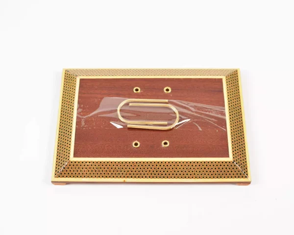 10 A distinctive and luxurious desk set, handcrafted from lemon wood and inlaid with copper