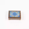 wooden box inlaid with copper with a traditional Islamic design