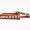 wooden box inlaid with copper with a traditional Islamic design