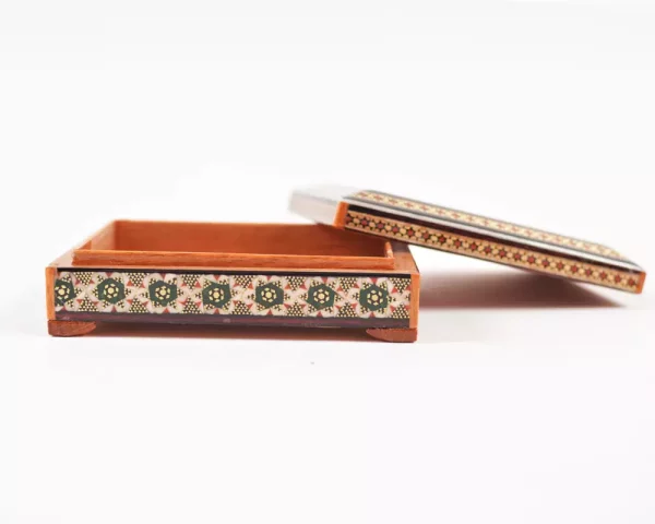 wooden box inlaid with copper with a traditional Islamic design