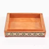 wooden box inlaid with copper with a traditional Islamic design