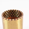 A distinctive and luxurious desk set, handcrafted from lemon wood and inlaid with copper