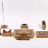 A distinctive and luxurious desk set, handcrafted from lemon wood and inlaid with copper