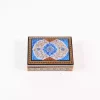 wooden box inlaid with copper with a traditional Islamic design