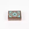 wooden box inlaid with copper with a traditional Islamic design
