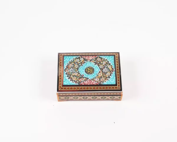 wooden box inlaid with copper with a traditional Islamic design