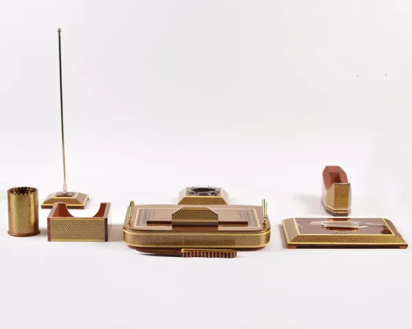 4 A distinctive and luxurious desk set, handcrafted from lemon wood and inlaid with copper