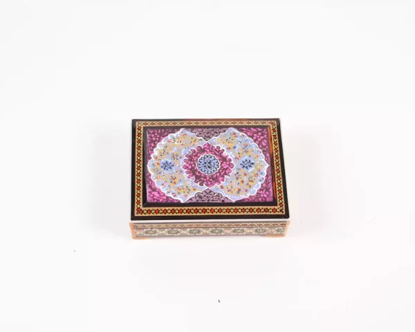 wooden box inlaid with copper with a traditional Islamic design