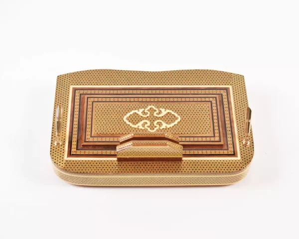 5 A distinctive and luxurious desk set, handcrafted from lemon wood and inlaid with copper