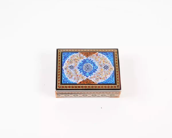 wooden box inlaid with copper with a traditional Islamic design