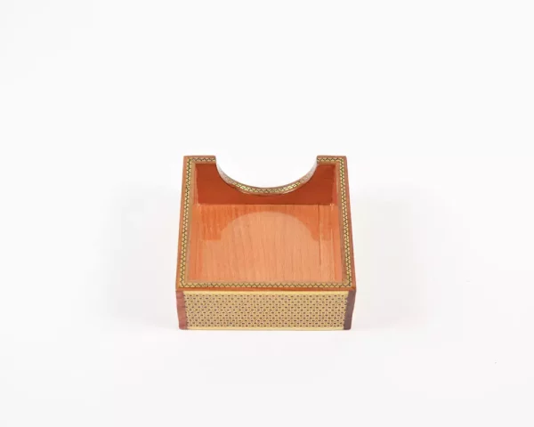 6 A distinctive and luxurious desk set, handcrafted from lemon wood and inlaid with copper