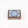wooden box inlaid with copper with a traditional Islamic design