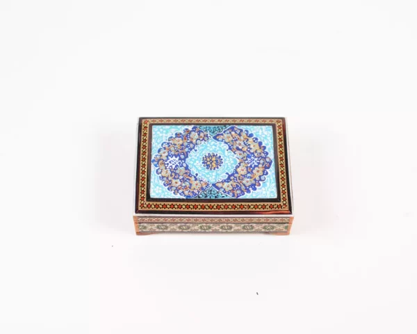 wooden box inlaid with copper with a traditional Islamic design