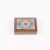 wooden box inlaid with copper with a traditional Islamic design