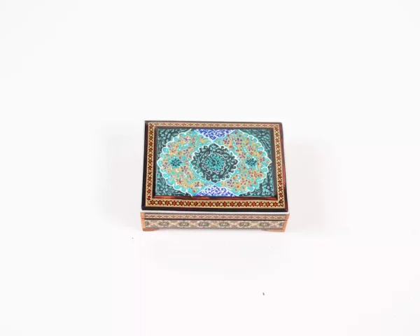wooden box inlaid with copper with a traditional Islamic design