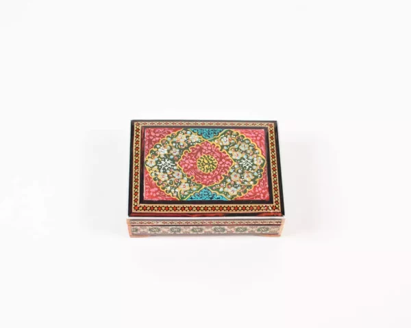 wooden box inlaid with copper with a traditional Islamic design