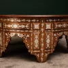 Handmade round wooden table inlaid with natural mother-of-pearl
