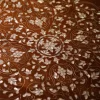 Handmade round wooden table inlaid with natural mother-of-pearl